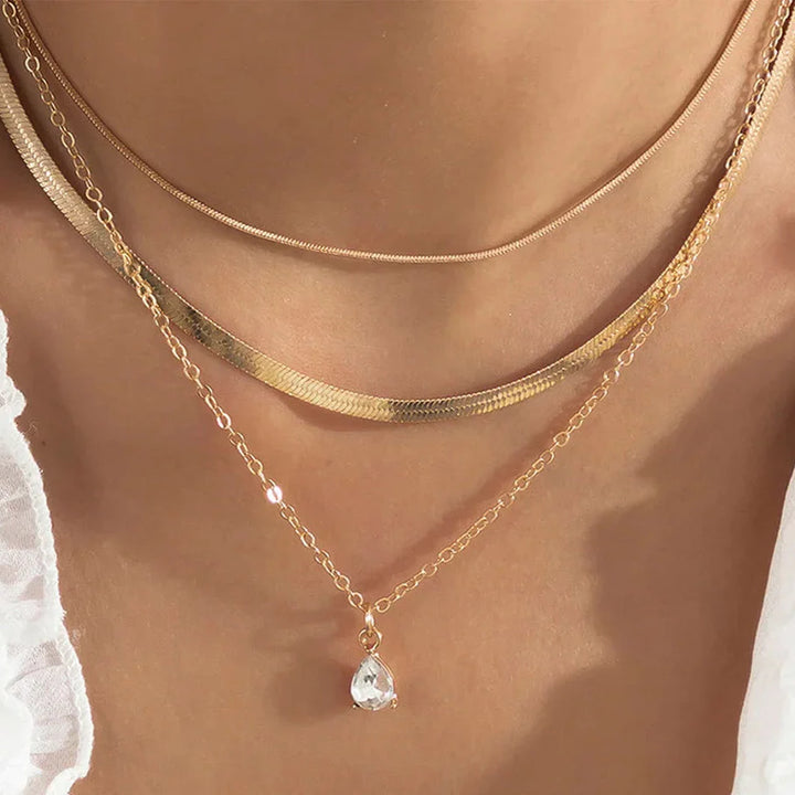 Raylee – Collier avec pendentif en zircone dorée superposée